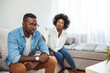 Angry Fury Man Screaming at Woman. Angry Couple Having an Argument in Their Living Room. Young Marriage Couple Have an Argument Because of Relationship Crisis. Couple Having Argument 