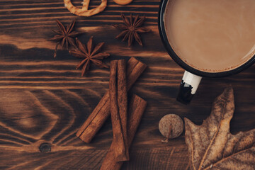 Fall Leafs, autumn themed decoration, And Coffee Cup On Wooden Table