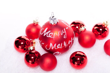 Wall Mural - christmas decoration festive red bauble in snow isolated