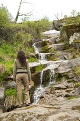 Wall Mural - woman down the torrent