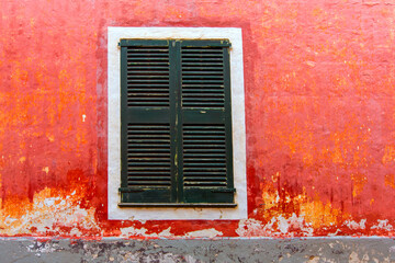 Canvas Print - Menorca Ciutadella red grunge facade texture