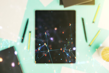 Poster - Double exposure of technology hologram and digital tablet on background, top view. Research and development software concept
