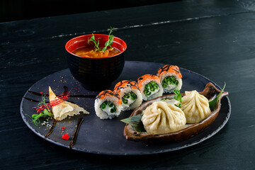 Wall Mural - Asian food set dumplings and sushi rolls