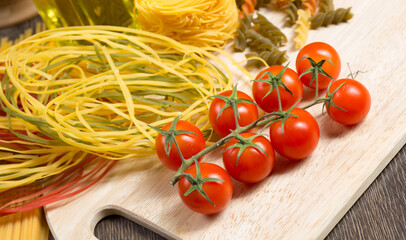 Wall Mural - close-up of cherry tomatoes and pasta