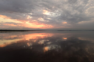 Wall Mural - Twilight sky in calmness and serenity in reflection on the water