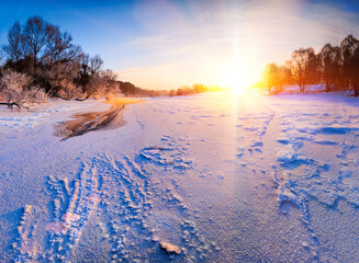 Poster - Sunrise over the frozen river - winter landscape