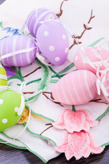 Sticker - colorful easter egg decoration on wooden background