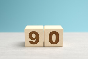 Wall Mural - Wooden toy blocks forming the number 90.