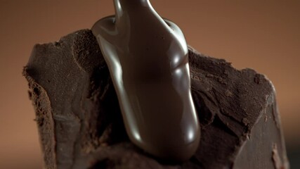 Poster - Super slow motion of pouring dark hot chocolate on piece of chocolate. Filmed with cinema high speed camera.