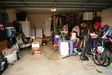 Fototapeta Morze - messy abandoned garage full of stuff