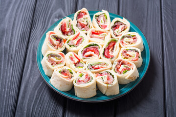 Canvas Print - Sliced sandwich tortilla with vegetables and ham