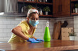 Woman housekeeping use sanitizer spray for Cleaning Covid-19 at home and Coronavirus outbreak or Covid-19