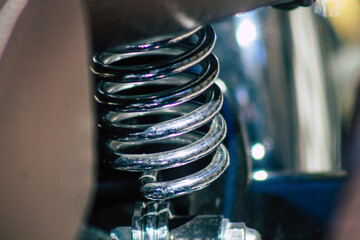 Canvas Print - Closeup of a motorcycle parked in the streets of the city center of the metropolitan area
