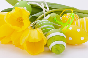 Wall Mural - Colourful yellow and green spring Easter Eggs