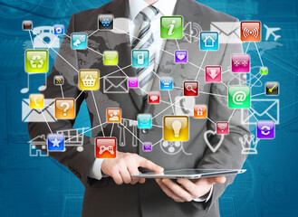 Poster - Man in suit holding tablet pc