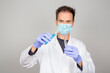 © luisrojasstock - doctor in laboratory investigating covid 19 coronavirus vaccine