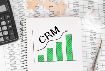 Poster - notebook with toolls and notes about crm,concept