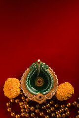 Canvas Print - happy diwali or happy deepavali greeting card made using a photograph of diya or oil lamp