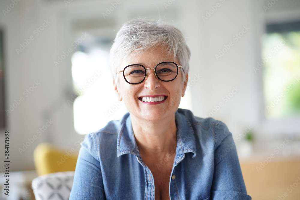 portrait of a beautiful smiling 55 year old woman with white hair - obrazy, fototapety, plakaty 