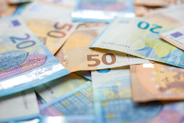 Wall Mural - Euro cash bundle background selective focus