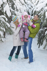 Canvas Print - Family at beautiful sunny winter day outdoor in nature