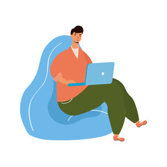 Sticker - young man working in laptop seated in sofa