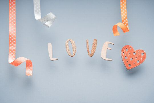 The word love on minimal pastel greeting card, frame, banner. Happy Valentines Day