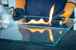 Cutting laminated glass, Burning through the foil connecting the glass panes