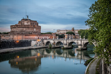 Wall Mural - Castel Sant'angelo and the bridge of Sant'angelo across the Tiber in Rome on a may evening. Rome, Lazio, Italy