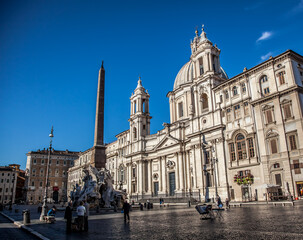 Wall Mural - Navona square, St. Agnes Church and the fountain of the Four rivers in Rome on a Sunny may morning. Rome, Lazio, Italy