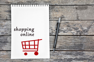 Wall Mural - Shopping online words on notebook page