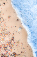 Poster - Sea Beach and Soft wave of blue ocean. Summer day and sandy beach background.