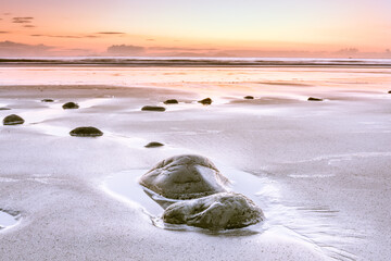 Wall Mural - Isle of Skye, Highlands of Scotland - sunset over Talisker Beach and ocean