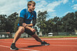 © TheSupporter - Young Caucasian man doing strength  exercises, side step lunges