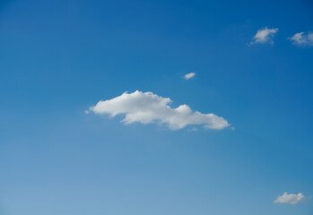 tiny single cloud blue sky minimalist