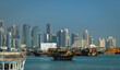 View of Doha's Financial District from the Cornish Waterfront with the Dhows moored in the Persian Golf, Qatar.