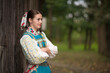 © muro - Slovak folklore. Traditional costume. Beautiful girl in traditional dress.
