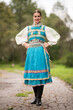 © muro - Slovak folklore. Traditional costume. Beautiful girl in traditional dress.
