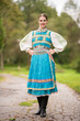 © muro - Slovak folklore. Traditional costume. Beautiful girl in traditional dress.