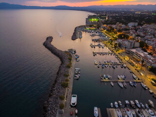 Aerial view of Kalamata marina with luxury yachts in line at dusk