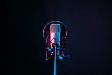 studio microphone and pop shield on mic in the empty recording studio with copy space. performance a