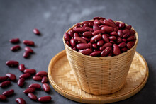 Red Beans Or Red Kidney Bean In Wicker Basket.