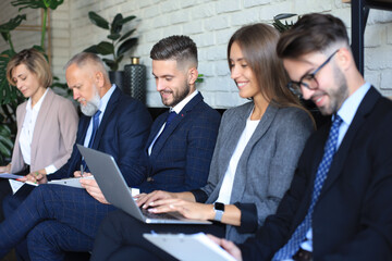 Wall Mural - Modern business people waiting for job interview.