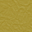 © artistmef - Yellow vintage and old looking crumpled paper background. Retro cardboard texture. Grunge paper for drawing. Ancient book page. Present wrapping.