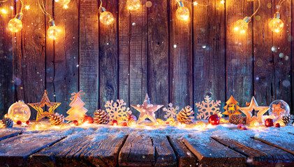 Wall Mural - christmas ornament with string lights on rustic wooden table