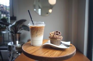 Iced Latte coffee in a cup with cake