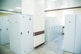 Fototapeta Tulipany - An empty locker room in the sports club, school, section