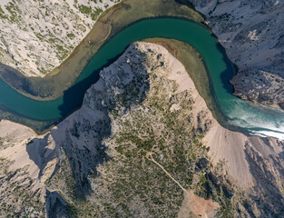 Sticker - Zrmanja River in northern Dalmatia, Croatia is famous for its crystal clear waters and countless waterfalls surrounded by a deep canyon.