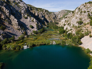 Canvas Print - Zrmanja River in northern Dalmatia, Croatia is famous for its crystal clear waters and countless waterfalls surrounded by a deep canyon.