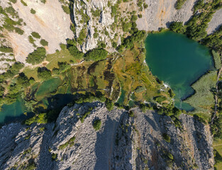 Sticker - Zrmanja River in northern Dalmatia, Croatia is famous for its crystal clear waters and countless waterfalls surrounded by a deep canyon.